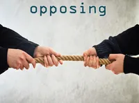 Định nghĩa của từ <b>opposing</b>