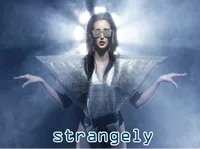Định nghĩa của từ <b>strangely</b>